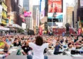 Yoga Enthusiasts Congregate In Times Square