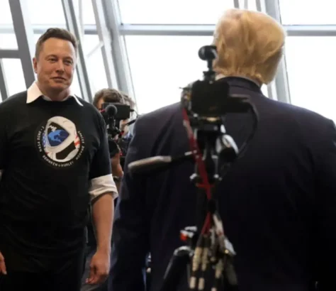 Musk Hugs Trump, Scorns Climate Change But Lobbies For & Uses Govt Benefits