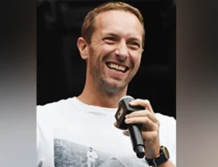 Prior To Grammys, Chris Martin Takes Dip In Triveni Sangam