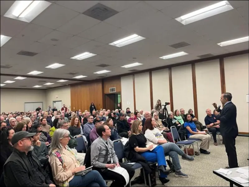 Raja-Krishnamoorthi-Faces-A-Packed-Town-Hall.webp