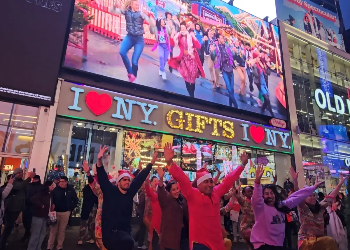 Times Square Dances To ‘Christmas Karma’
