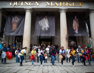 Boston crowds celebrate Holi despite cold.