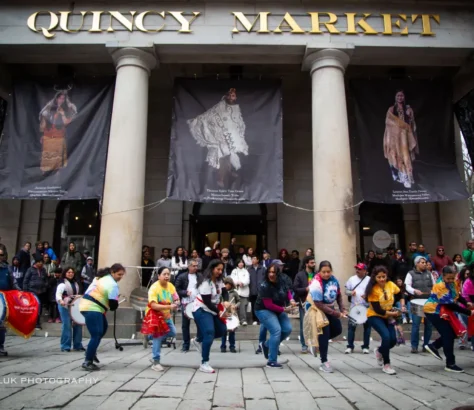 Boston crowds celebrate Holi despite cold.