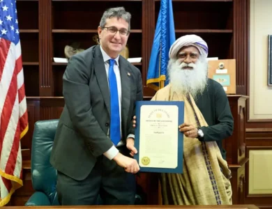 Sadhguru honored by Delaware Governor for his work.