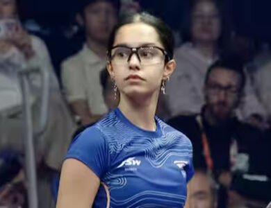 Anahat Singh competes in a squash match