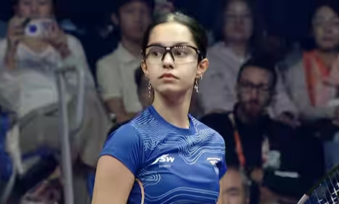 Anahat Singh competes in a squash match