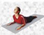 Person practicing Bhujangasana with chest lifted and palms beside the chest