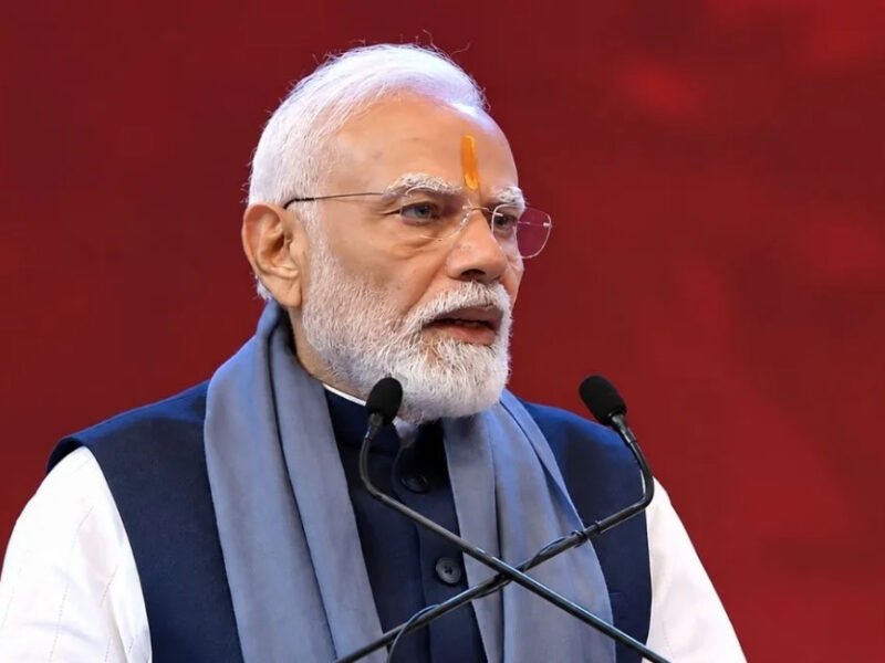 Narendra Modi interacts with a holographic avatar of Swami Chinmayananda at the Chinmaya Mission anniversary event