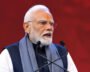 Narendra Modi interacts with a holographic avatar of Swami Chinmayananda at the Chinmaya Mission anniversary event