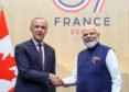 Indian Prime Minister Narendra Modi and Canadian Prime Minister Mark Carney
