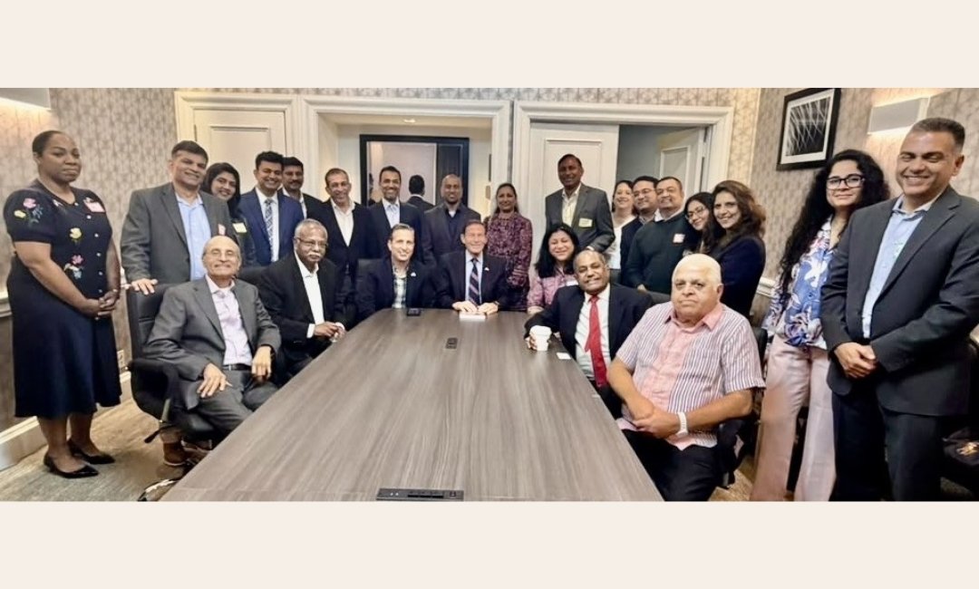 Indian American community members with U.S. and state senators at a Stamford fundraiser