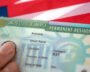 New U.S. citizens take the oath of allegiance at a naturalization ceremony
