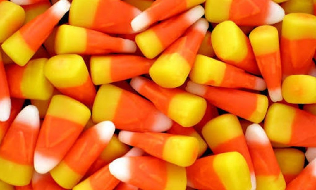 Bags of Halloween candy displayed on supermarket shelves