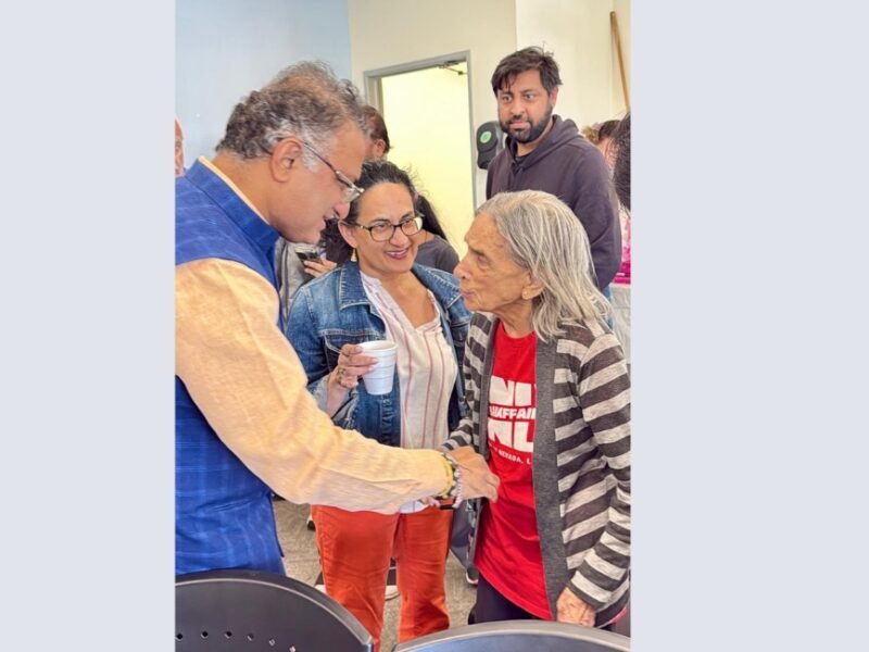 Indian consular officials assist community members at a Las Vegas consular camp