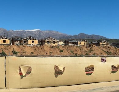 Urban development bordering farmland and open space in California