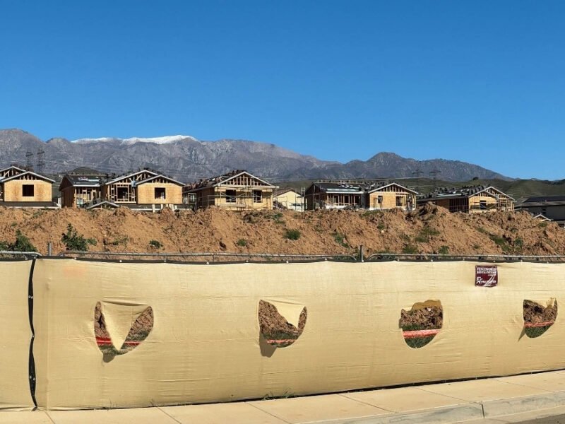 Urban development bordering farmland and open space in California