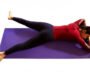 Person practicing Makarasana with forehead resting on stacked hands and feet apart