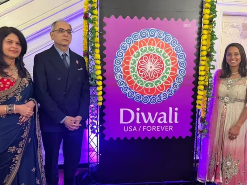 USPS Diwali Forever stamp featuring a colorful rangoli against a purple background