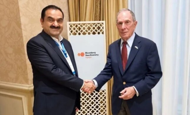 Mike Bloomberg meets Gautam Adani at the Bloomberg New Economy Forum in New Delhi
