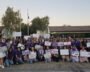 Community members gather for a domestic violence awareness candlelight vigil in Fremont