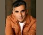 Voice actor Sunil Malhotra and The Simpsons character Apu Nahasapeemapetilon