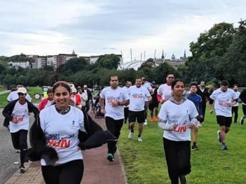 Participants take part in the Viksit Bharat Unity Run with yoga and meditation near Washington, organized by the Embassy of India.