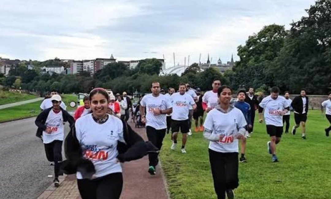 Participants take part in the Viksit Bharat Unity Run with yoga and meditation near Washington, organized by the Embassy of India.